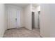 Inviting foyer with tiled flooring, leading to other areas of the home at 12474 W Glenn Ct, Glendale, AZ 85307