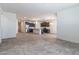 Open floorplan kitchen and living room with tile flooring at 12474 W Glenn Ct, Glendale, AZ 85307