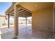 Covered patio with stylish pergola offers ample shade at 12474 W Glenn Ct, Glendale, AZ 85307