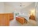 Cozy bedroom with vaulted ceilings, neutral carpet, and ample natural light at 14999 W Mulberry Dr, Goodyear, AZ 85395
