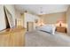 Well-lit bedroom with neutral carpet, ample closet space and neutral paint at 14999 W Mulberry Dr, Goodyear, AZ 85395