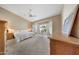 Spacious main bedroom with vaulted ceiling, and large windows at 14999 W Mulberry Dr, Goodyear, AZ 85395
