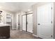 Bathroom featuring a glass shower enclosure and modern design, tiled floors at 15622 S 181St Dr, Goodyear, AZ 85338