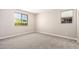 Bright bedroom featuring two windows that provide natural light and views at 15622 S 181St Dr, Goodyear, AZ 85338