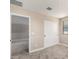 Comfortable bedroom with sliding door closet, plush carpet, and sunlit window at 15622 S 181St Dr, Goodyear, AZ 85338