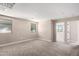 Inviting bedroom featuring plush carpeting, natural light, and neutral color palette at 15622 S 181St Dr, Goodyear, AZ 85338