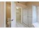 Bright bathroom features walk-in shower, toilet, and access to walk-in closet at 1668 E Melissa St, Casa Grande, AZ 85122