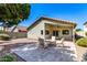 Inviting backyard patio area with outdoor seating, perfect for entertaining with a built in gas grill at 3269 E San Remo Ave, Gilbert, AZ 85234