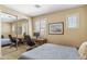 Bedroom with a desk, closet and comfortable bed at 6409 N 11Th Dr, Phoenix, AZ 85013