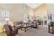 Spacious living room with high ceilings, ample seating, and natural light, creating a perfect gathering space at 6409 N 11Th Dr, Phoenix, AZ 85013