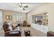 Comfortable living room features large window and built-in entertainment center at 6409 N 11Th Dr, Phoenix, AZ 85013