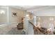 Upstairs loft area with carpet flooring and staircase view at 6409 N 11Th Dr, Phoenix, AZ 85013