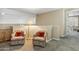 Upstairs loft with neutral tones, carpet and view to other rooms at 6409 N 11Th Dr, Phoenix, AZ 85013