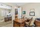 Office area with natural light, a chair, and a large desk at 6409 N 11Th Dr, Phoenix, AZ 85013