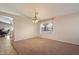 Open-concept dining room featuring large windows and neutral colored walls at 1024 N Ithica Ct, Chandler, AZ 85225