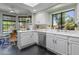 Well-lit kitchen showcasing modern appliances, counter space, and bright breakfast nook at 10591 E Saddlehorn Dr, Scottsdale, AZ 85258
