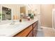 Bright bathroom featuring dual sinks, ample counter space, and modern fixtures for a comfortable and functional space at 10861 E Olla Ave, Mesa, AZ 85212