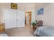 Comfortable bedroom featuring closet, decor, and an ensuite bath for added privacy at 10861 E Olla Ave, Mesa, AZ 85212