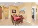 Cozy dining area with tile flooring and desert artwork at 10861 E Olla Ave, Mesa, AZ 85212