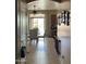 Eat-in kitchen area with chairs and a glass table at 1194 E Coyote Creek Way, San Tan Valley, AZ 85143