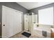 Bathroom featuring a shower, a soaking tub, a large closet, and neutral colors at 14091 W Bloomfield Rd, Surprise, AZ 85379