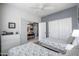 Bedroom featuring twin beds, carpeted floors, and gray walls at 14091 W Bloomfield Rd, Surprise, AZ 85379
