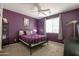 Stylish bedroom featuring a queen bed, carpeted floors, and a ceiling fan at 14091 W Bloomfield Rd, Surprise, AZ 85379