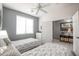 Bedroom featuring twin beds, carpeted floors, and neutral finishes at 14091 W Bloomfield Rd, Surprise, AZ 85379