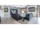 Comfortable living room featuring plush sofas, contemporary decor, and lots of space at 14091 W Bloomfield Rd, Surprise, AZ 85379