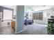 Main bedroom with walk-in closet and en suite bathroom featuring a soaking tub at 14091 W Bloomfield Rd, Surprise, AZ 85379