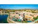 Aerial view of a waterfront community featuring beautiful homes, private pools, and scenic lake views at 16226 S 11Th Pl, Phoenix, AZ 85048