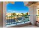 Balcony view of community landscaping with clear, sunny blue sky at 16226 S 11Th Pl, Phoenix, AZ 85048