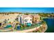 Stunning two-story home with a private pool, lush landscaping, and lake views in a desirable community at 16226 S 11Th Pl, Phoenix, AZ 85048