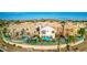 Beautiful two-story home featuring a private pool, well-manicured backyard, and scenic views of the community lake at 16226 S 11Th Pl, Phoenix, AZ 85048