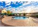 Enjoy a relaxing hot tub experience with lake views under a sunny sky, ideal for unwinding after a long day at 16226 S 11Th Pl, Phoenix, AZ 85048