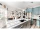 Spacious kitchen with an island open to the living and dining area, with modern appliances and ample counter space at 16226 S 11Th Pl, Phoenix, AZ 85048