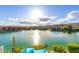 Expansive lake view showcasing the community's waterfront living and mountain views in the distance at 16226 S 11Th Pl, Phoenix, AZ 85048