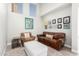 Comfortable living room with high ceilings, unique wall decor and neutral tones at 16226 S 11Th Pl, Phoenix, AZ 85048