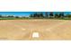 An outdoor baseball field offering recreational opportunities for residents at 18031 W Udall Dr, Surprise, AZ 85374