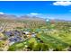 Panoramic aerial view showcasing golf course community with mountain backdrop and amenities at 20750 N 87Th St # 2038, Scottsdale, AZ 85255