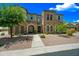 Beautiful stone and stucco home with a landscaped front yard and welcoming entrance at 20750 N 87Th St # 2038, Scottsdale, AZ 85255