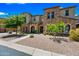 Beautiful stone and stucco home with a landscaped front yard and welcoming entrance at 20750 N 87Th St # 2038, Scottsdale, AZ 85255