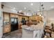 Charming kitchen with granite countertops, updated appliances, and barstool seating at 20750 N 87Th St # 2038, Scottsdale, AZ 85255