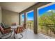 Spacious patio offers an outdoor dining area and a view of the expansive green golf course at 20750 N 87Th St # 2038, Scottsdale, AZ 85255