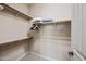 Walk-in closet featuring shelves and storage racks at 20750 N 87Th St # 2038, Scottsdale, AZ 85255