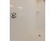 Shower featuring tile floors, a glass shower wall, a shower head, and a chrome shower handle at 2205 S 241St Dr, Buckeye, AZ 85326