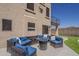 Inviting back patio with stylish outdoor furniture and a cozy fire pit, perfect for entertaining at 2405 W Cordia Ln, Phoenix, AZ 85085