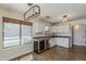 Open-concept kitchen features stainless steel appliances and outdoor views at 2405 W Cordia Ln, Phoenix, AZ 85085