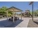 Park picnic area with shaded tables, grill, and playground for outdoor enjoyment at 2405 W Cordia Ln, Phoenix, AZ 85085