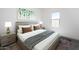 Comfortable bedroom with a large window and neutral decor at 24252 W Pecan Rd, Buckeye, AZ 85326
